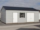 12x24 Peak Style Storage Shed with Vinyl Siding and Workshop Shelving Package