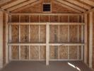 10x12 Front Entry Peak Style Storage Shed with Shelves Built Inside From Pine Creek Structures